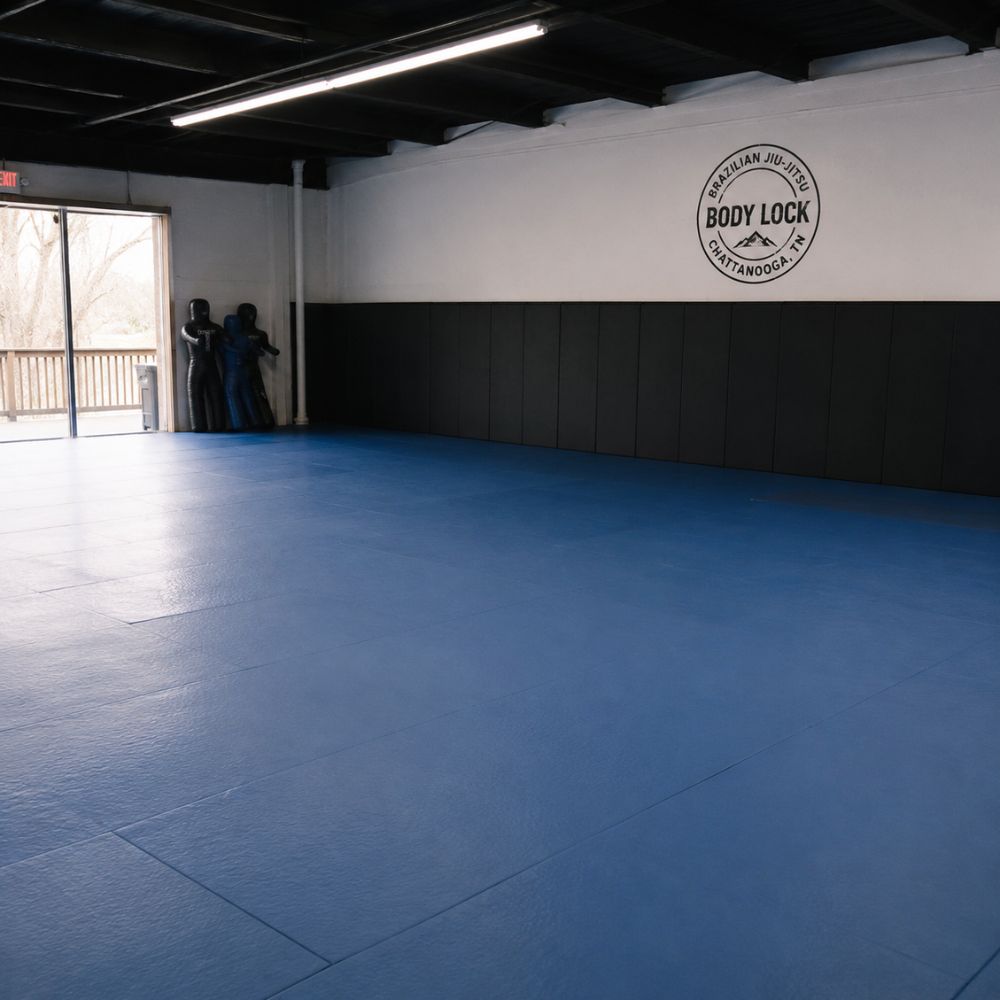 BJJ gym with blue mats