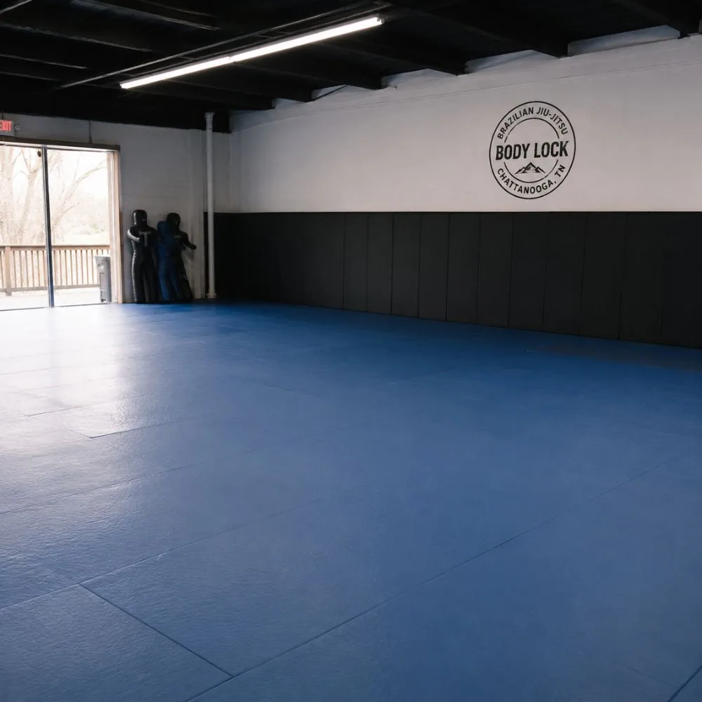 BJJ gym with blue mats
